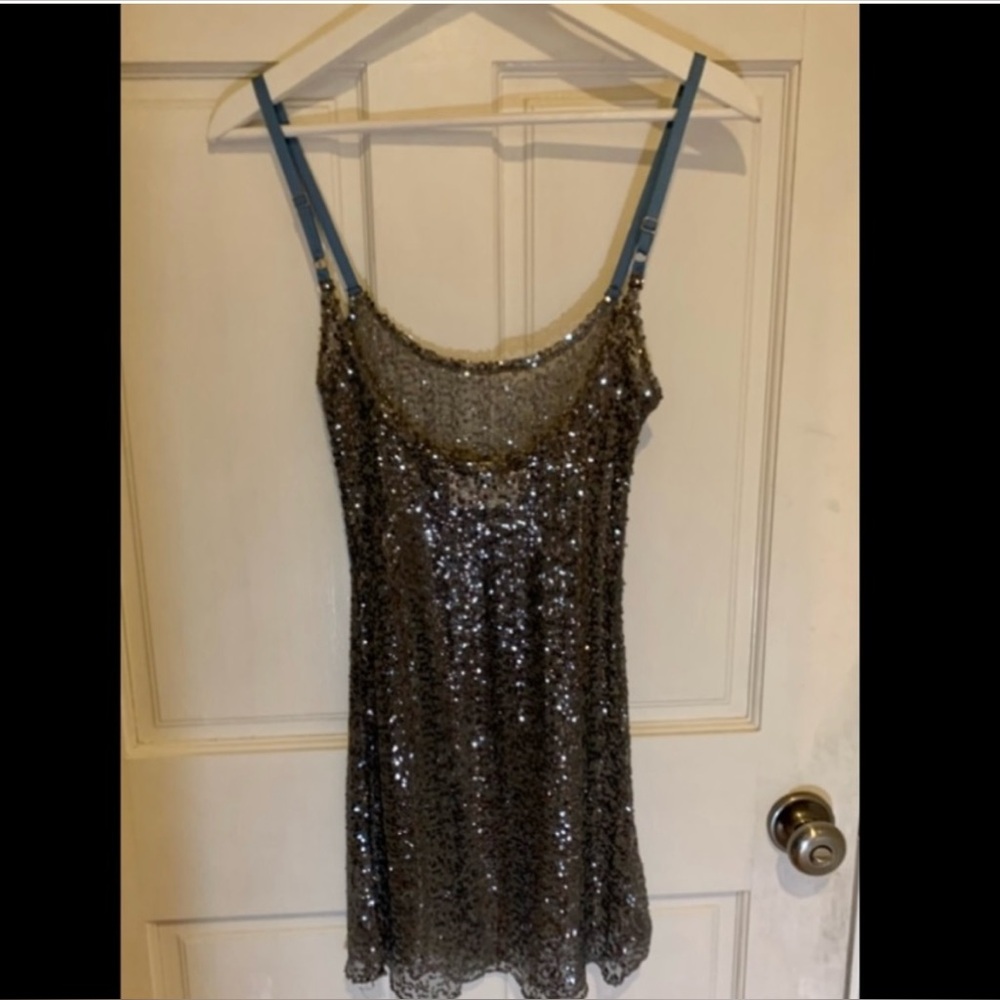 Size small, stretchy , dry clean.has baby blue straps , very sexy..